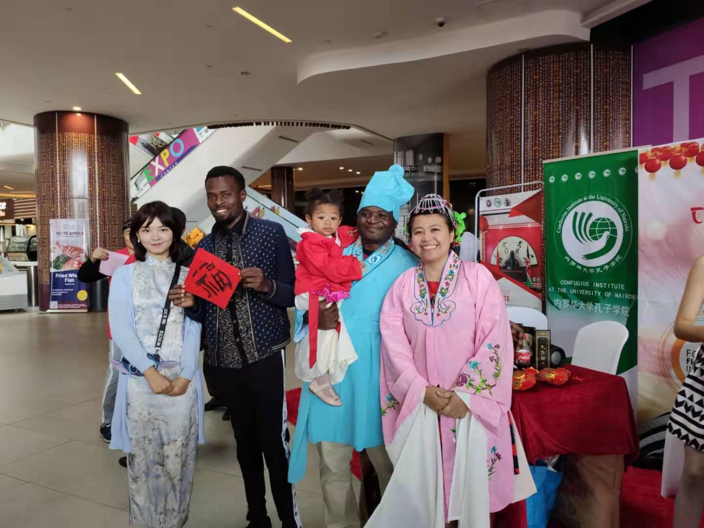 people try traditional Chinese costume